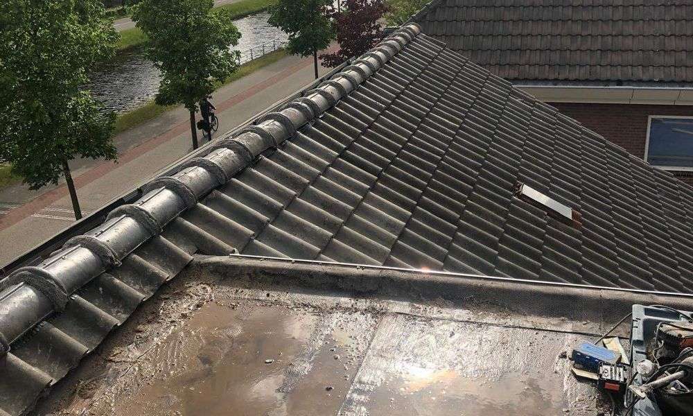 Lekkage op plat dak in Berghem
